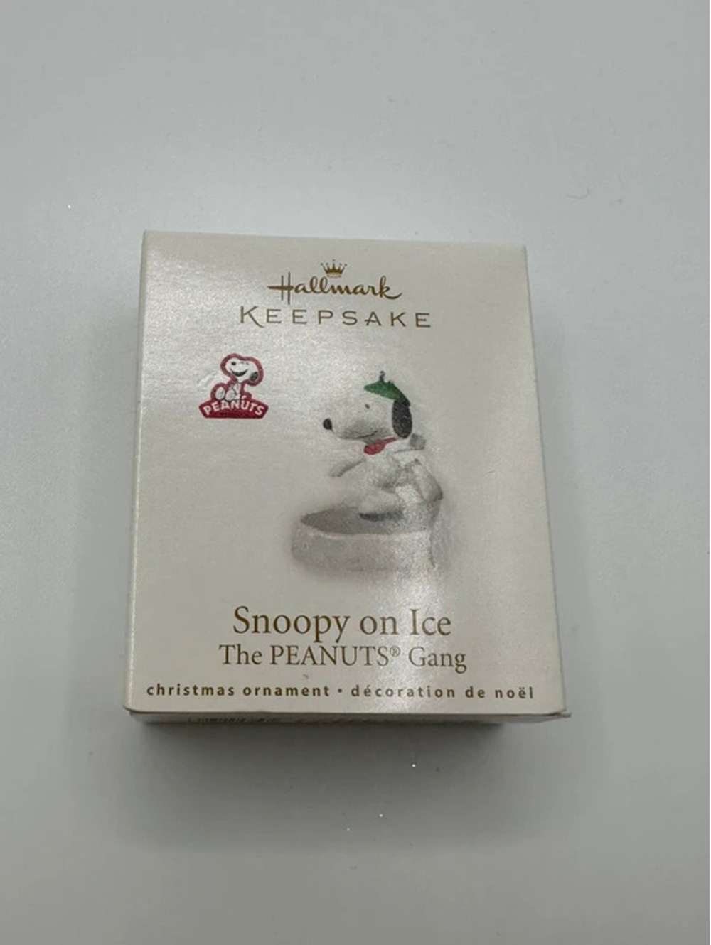 Hallmark keepsake miniature Snoopy on ice the peanuts gang ornament dated 2010